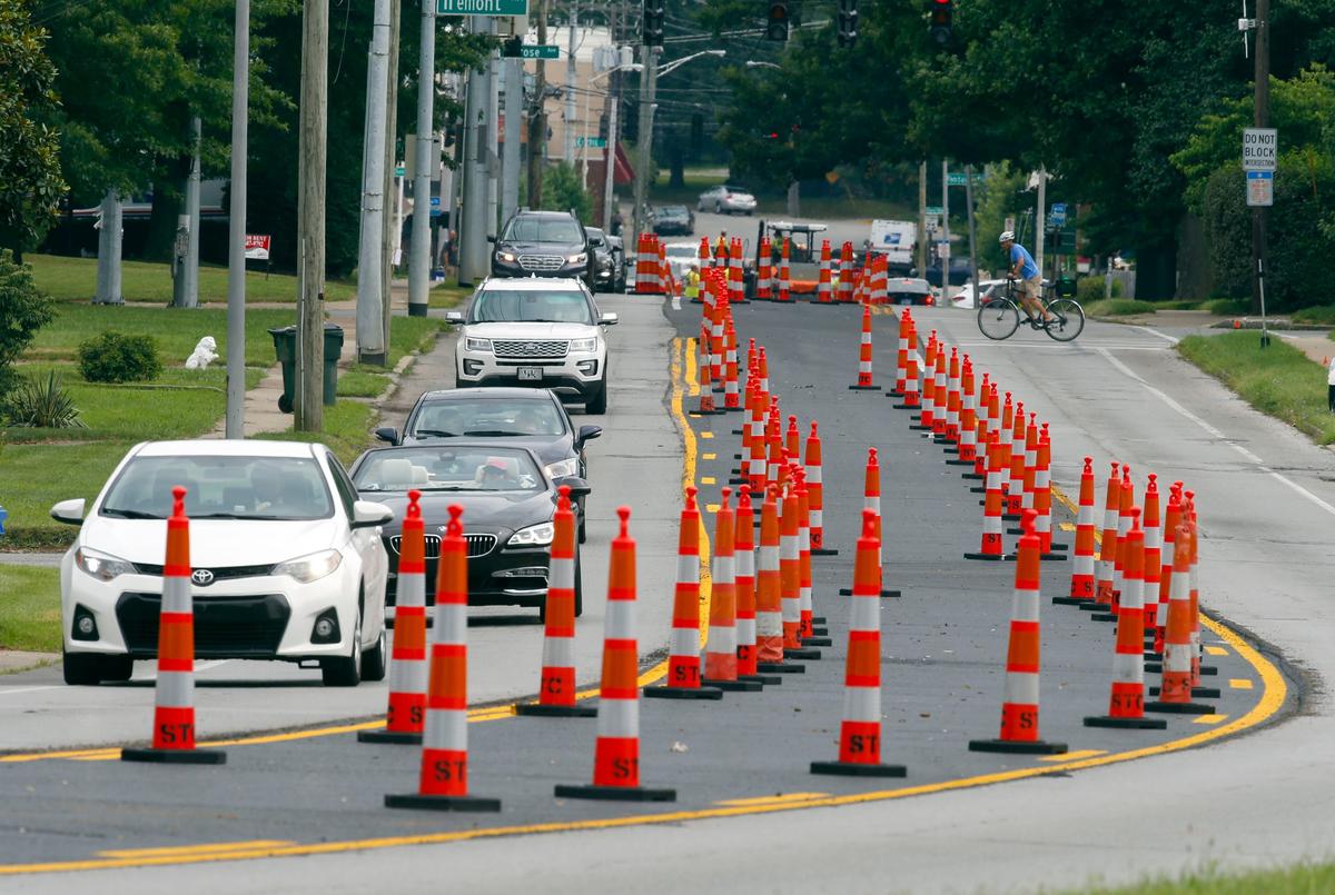 Crews worked Monday morning on paving the turn lane of Tates Creek Road from near Cooper Drive to Cochran Road. The city of Lexington recently took ownership of Tates Creek Road from New Circle Road to downtown.