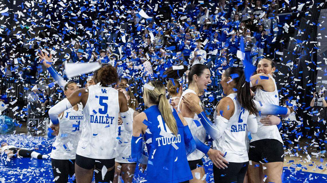 Kentucky outside hitter Eva Hudson, third from right, celebrates with her teammates after UK’s 3-0 win over Arkansas on Sunday at Memorial Coliseum. The win gave UK its ninth straight SEC championship.