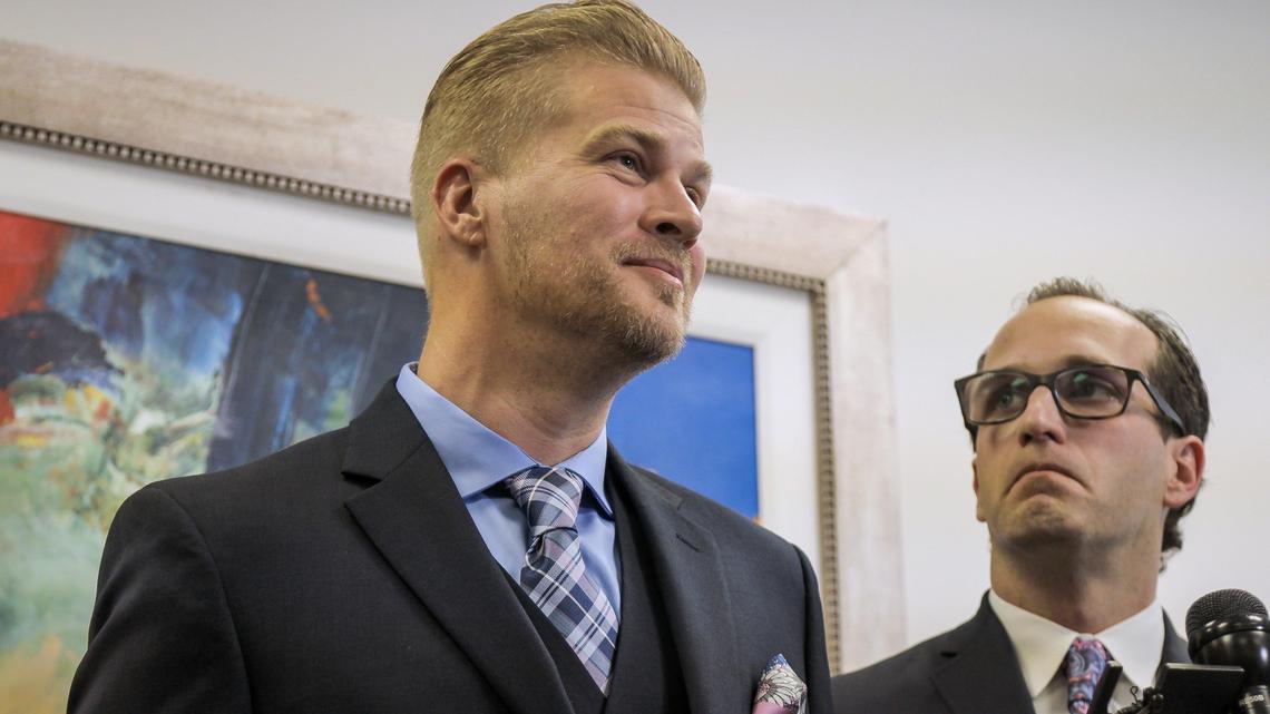 Patrick Baker, left, who was convicted in a 2014 homicide, stood with attorney Elliot Slosar, right, on Dec. 17, 2019, as he talked about being pardoned by former Governor Matt Bevin, resulting in his early release from prison.