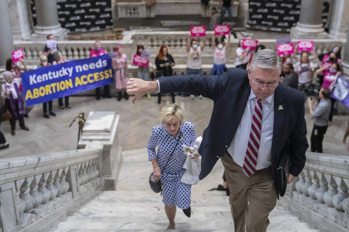 State Rep. Randy Bridges, R-Paducah, gives a thumbs down as protesters chant “Bans off our bodies” at the Kentucky state Capitol on Wednesday, April 13, 2022. Protesters chanted “Bans off our bodies” as they anticipated Kentucky Gov. Andy Beshear’s veto of a sweepingly restrictive abortion bill, HB3, would be overridden.