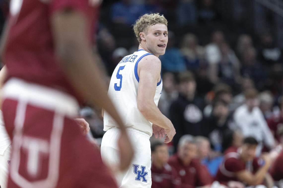 Kentucky guard Collin Chandler (5) smiles after scoring a basket during a first-round NCAA Tournament game against Troy at Fiserv Forum in Milwaukee on Friday.