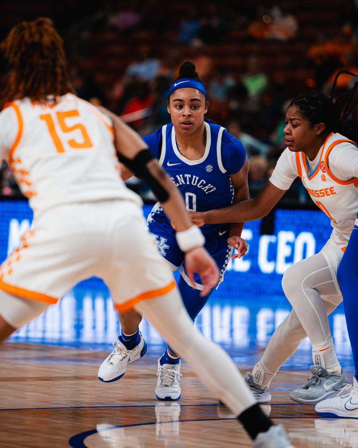 Kentucky’s Brooklynn Miles (0) searches for an opening in the Tennessee defense during Thursday’s SEC Tournament second-round game at Greenville, South Carolina. Miles, a star of UK’s first-round win over Georgia on Wednesday, was held scoreless Thursday.