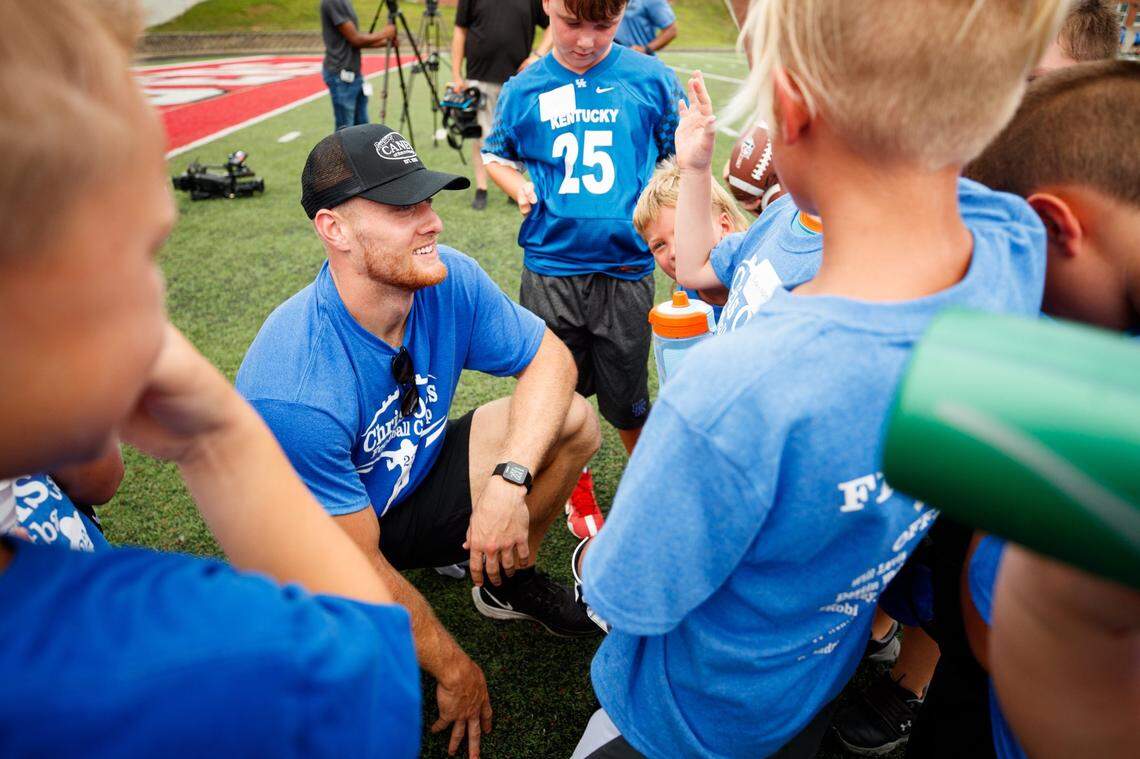 Kentucky quarterback Will Levis talks with a group of kids during the Chris Oats Football Camp. “I didn’t know Chris until I got here, but when I heard about his story, I was very moved by it. And we just have to do anything we can to support him and get behind him and his family,” he said.