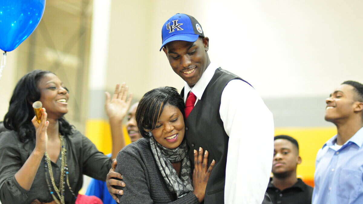 Alex Poythress hugged his mother, Regina, on signing day at Northeast High School in Clarksville, Tenn.