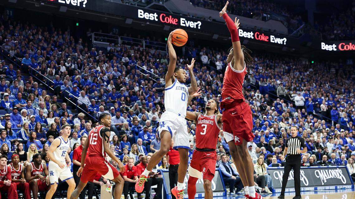 Rob Dillingham sparks a Kentucky basketball comeback. Cats avoid Arkansas upset in Rupp.