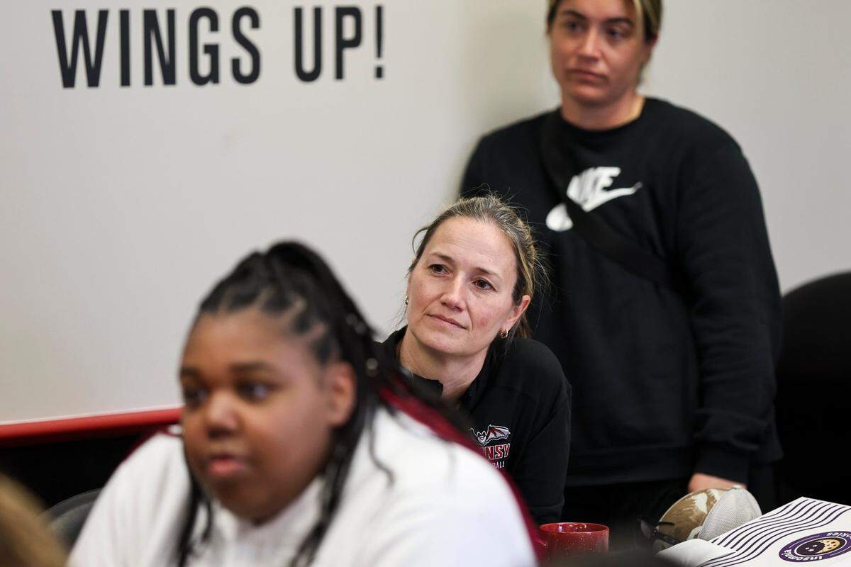 Transylvania coach Juli Fulks, center, says her team’s seniors “were devastated” by last month’s 57-42 loss to New York University in the NCAA Division III Final Four that ended the Pioneers’ quest for a second straight undefeated national title. “They only envisioned a back-to-back national championship,” Fulks says. “… it will just break their heart forever.”