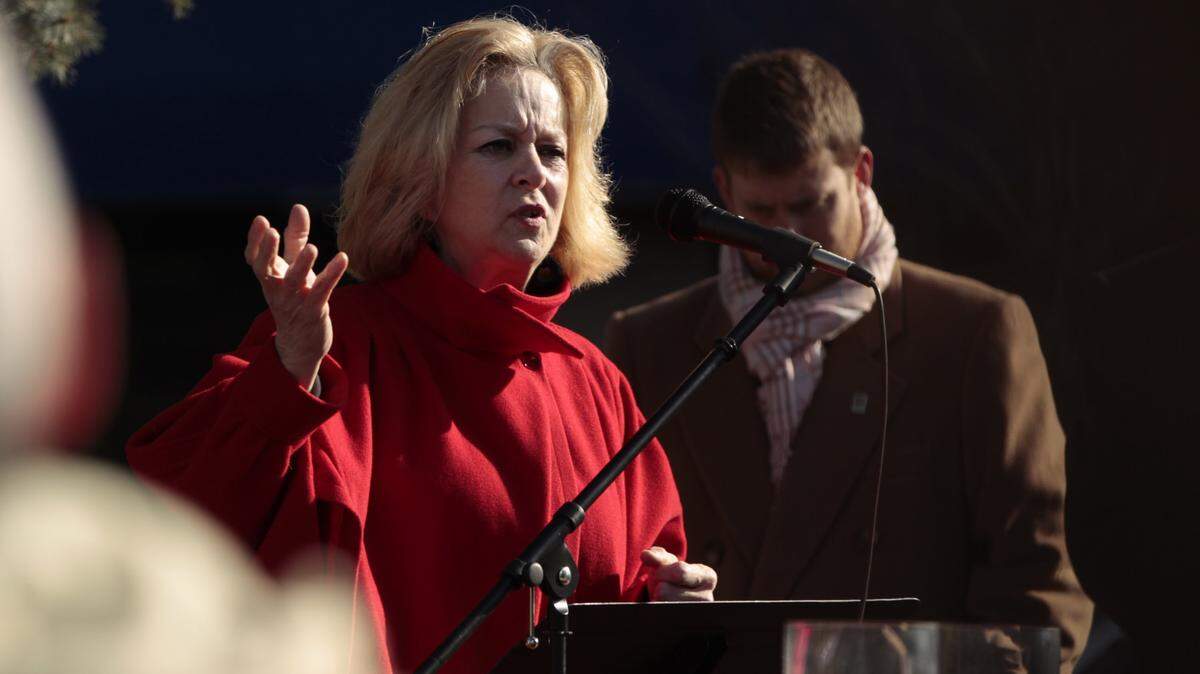 Sen. Kathy Stein, D-Lexington, spoke after clergy during a vigil for victims of the Sandy Hook shooting at Triangle Park in Lexington, Ky., on Jan. 5, 2013. About 150 people attended the vigil while the Lexington Gun and Knife Show was taking place at the Lexington Center nearby. Photo by Pablo Alcala | Staff