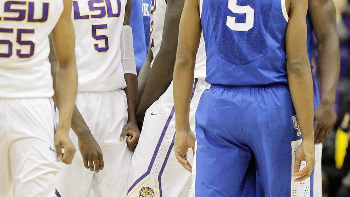 LSU celebrated a favorable call in the last minute of in the second half of the Kentucky at LSU men's basketball game at the Maravich Center in Baton Rouge, La.,, on Jan. 28, 2014. LSU beat Kentucky 87-82.  Photo by Pablo Alcala | Staff