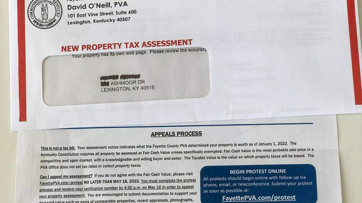A sample property assessment form and the envelope it’s mailed within. 