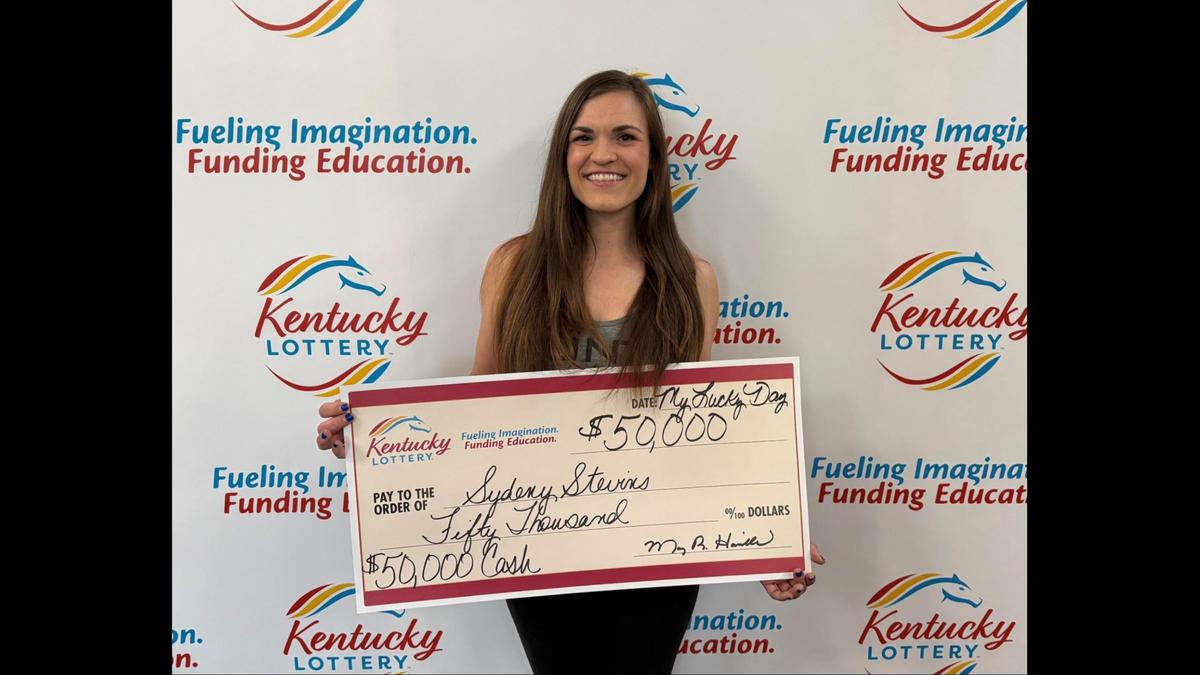 Sydeny Stevins, of Alexandria in Campbell County, poses with her winnings.