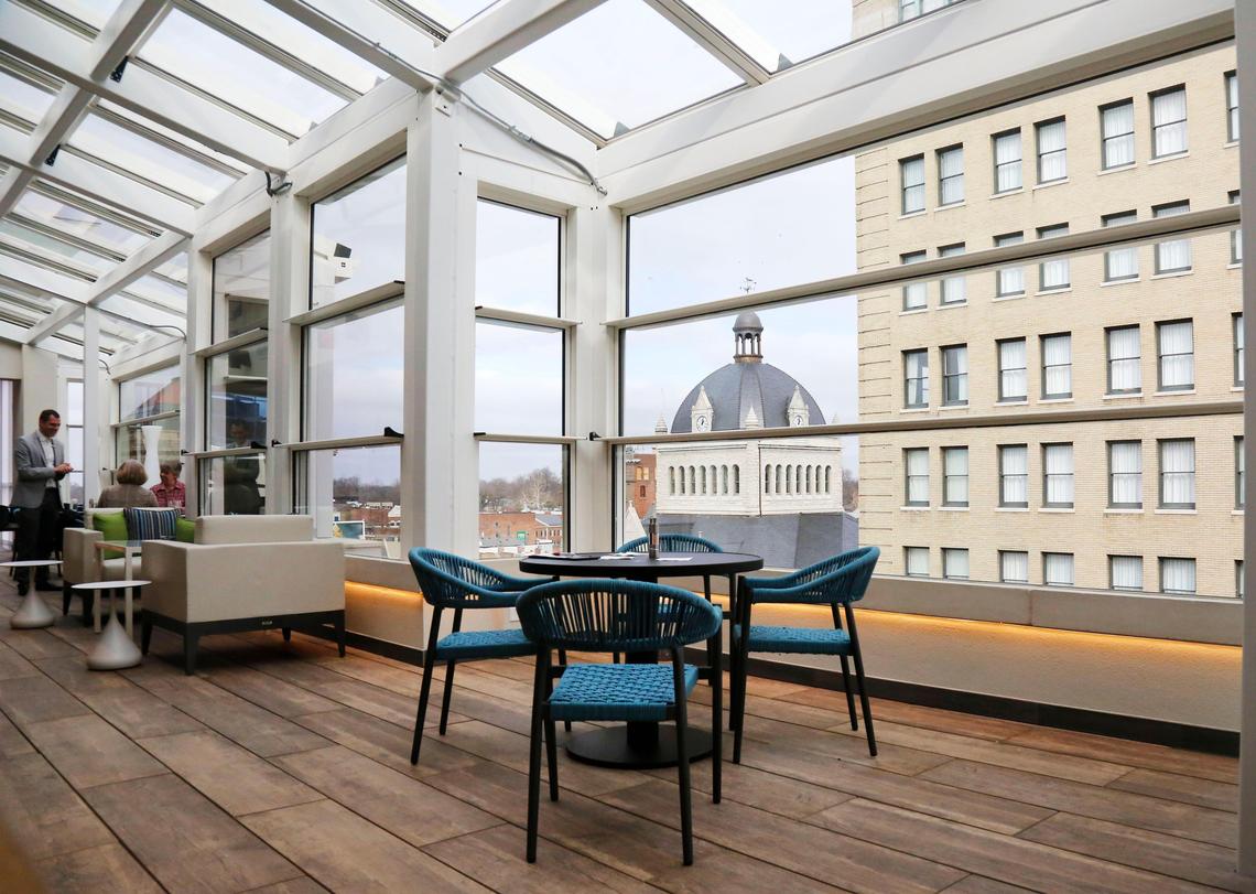 In warmer weather, the walls and the ceiling panels in the dining room at Infinity: Skybar & Cafe on the roof of downtown Lexington’s Residence Inn retract, so you can catch the breeze.