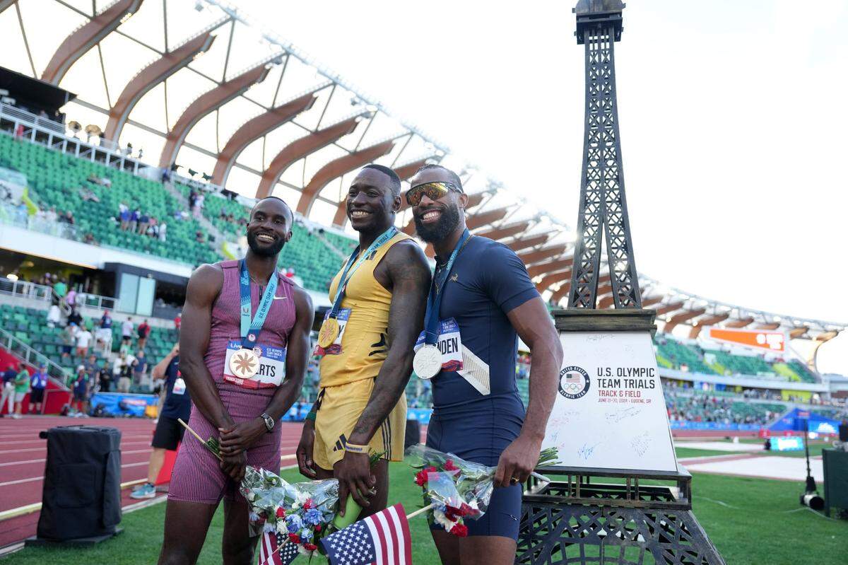 Jun 28, 2024; Eugene, OR, USA; Men's 110m hurdles gold medalist Grant Holloway (center) poses wtih silver medalist Freddie Crittenden (right) and bronze medalist Daniel Roberts during the US Olympic Team Trials at Hayward Field. Mandatory Credit: Kirby Lee-USA TODAY Sports