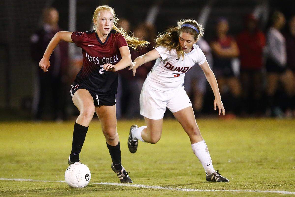 Tates Creek’s Carsyn Prigge (2), shown going up against Paul Laurence Dunbar’s Alison O’Hara (5) last year, suffered a season-ending knee injury during a preseason camp ahead of her junior season. She will have surgery next month and will continue to help the team on the sidelines and at practice, Coach Ally Tucker said.