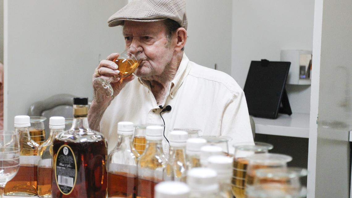 Master distiller emeritus Elmer T. Lee sampled some bourbon at Buffalo Trace  in Frankfort last week. Photo by Mark Cornelison | Staff