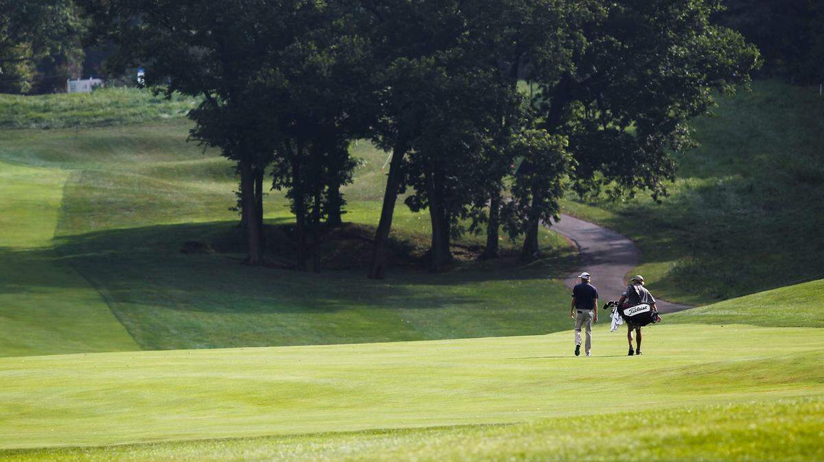 Richy Werenski, left, walked the course on the 12th hole at Champions at Keene Trace during a practice round for the PGA Tour’s Barbasol Championship. Werenski’s best PGA finish this season was a tie for fourth at the FedEx St. Jude Classic on June 10.