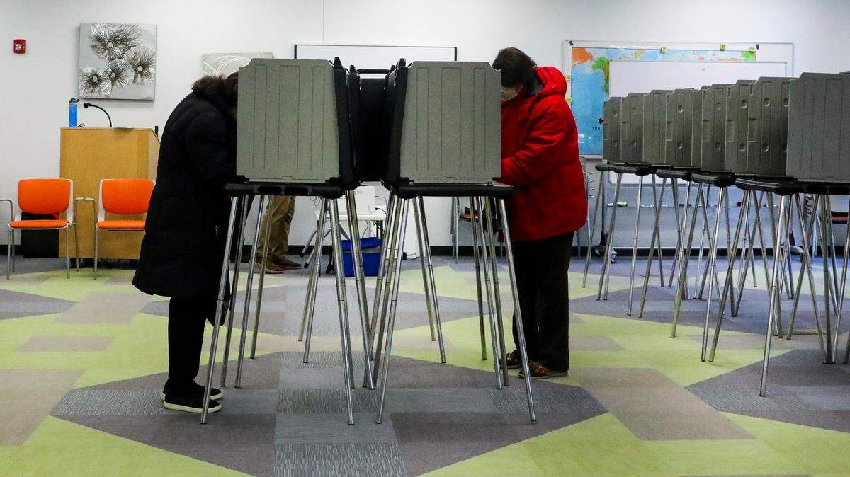 Voters cast their ballots for the 2023 statewide general election during early voting at the Lexington Senior Center, Thursday, November 2, 2023 in Lexington, Ky.