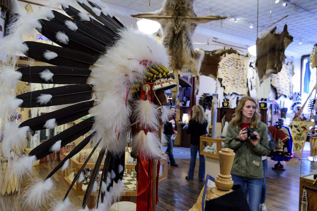 Located on 6th Street and Main in downtown Rapid City, Prairie Edge stands two stories high and stretches out for half a block. Inside, the hardwood floors and polished cabinetry bring to mind the spirit of the Old West, while the distinct smell of sweetgrass and soft sound of a Lakota flute evoke the mystique of the Great Plains Indian.