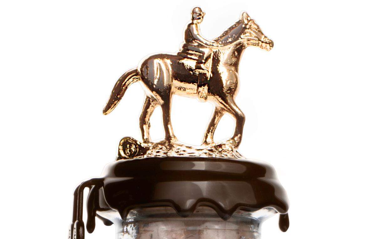 The horse and jockey topper on each bottle will be gold, and feature different letters that spell out “BLANTONS.”