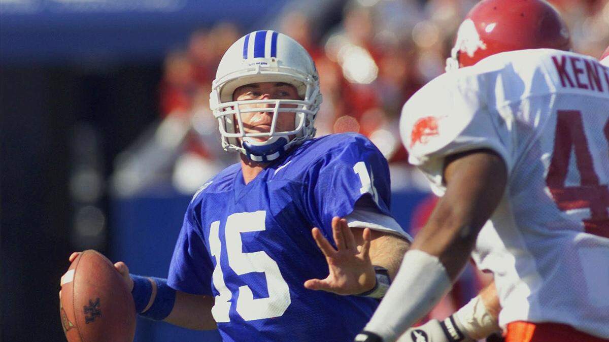 Kentucky quarterback Dusty Bonner (15) led the Wildcats to a 31-20 victory over Arkansas in 1999 in the venue then known as Commonwealth Stadium.