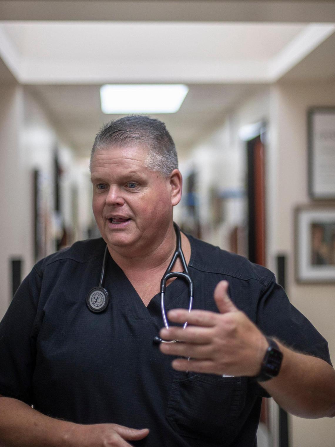Van Breeding, clinical director at MCHC Whitesburg Medical Clinic in Whitesburg, Ky., talks Monday, Aug. 1, 2022, about what it took to open the clinic days after it was covered in mud caused by devastating flooding.