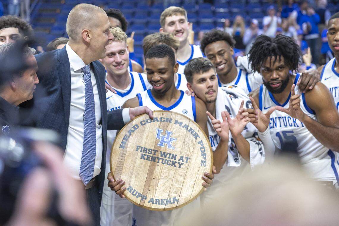 Kentucky head coach Mark Pope was presented with a bourbon barrel lid commemorating his first regular-season win with the Wildcats following Monday’s win against Wright State at Rupp Arena.