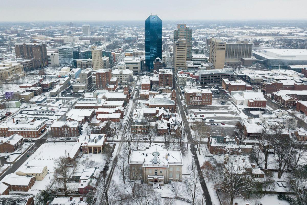 Snow falls in Lexington, Ky, Friday, January 19, 2024.