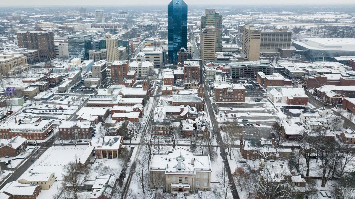Snow falls in Lexington, Ky, Friday, January 19, 2024.