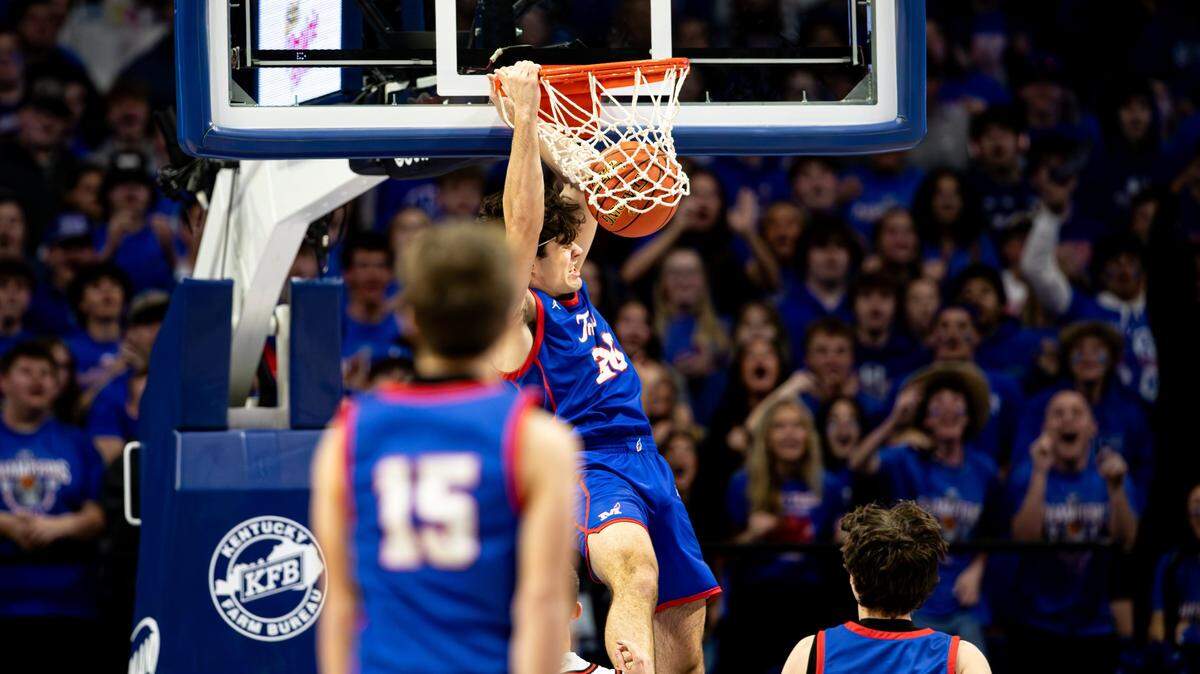 Dane Klute dunks for two of his seven points Thursday during Montgomery County's win over Lawrence County in Rupp Arena. Klute also had seven rebounds and three assists.