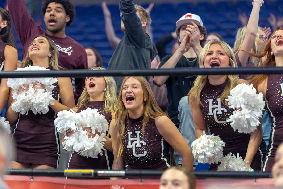 The Henderson County student section cheers during the first round of last season’s Girls’ Sweet 16 state basketball tournament at Rupp Arena on March 14.