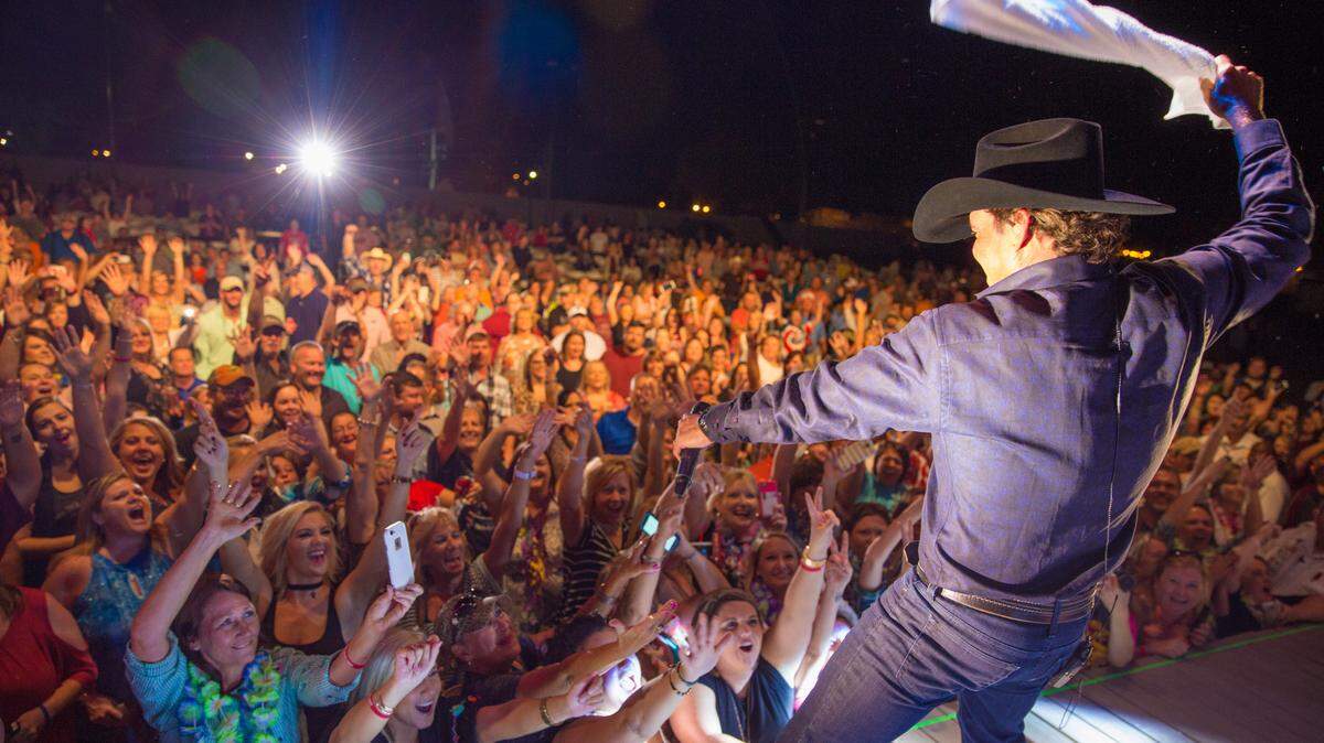 Country singer Clay Walker says that he wants to spread joy because being around joy has helped him overcome MS and keep his music career going.