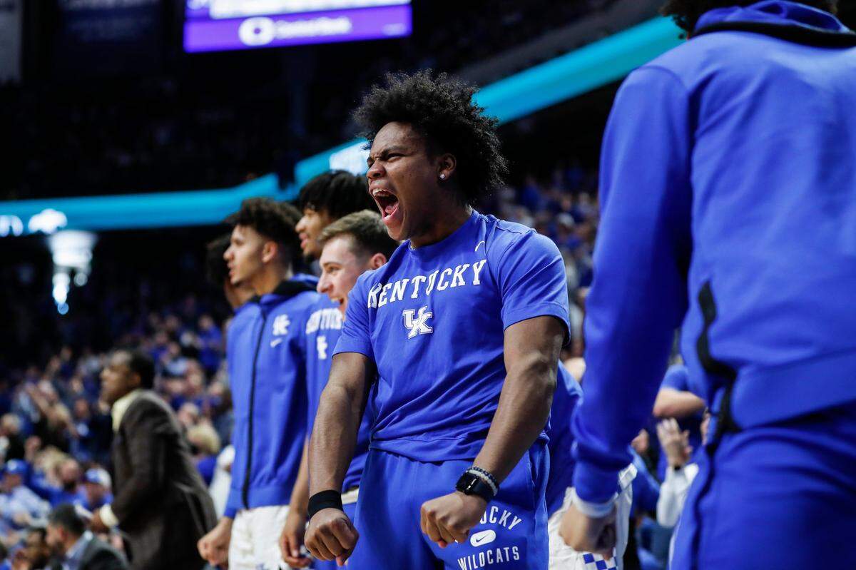 Kentucky point guard Sahvir Wheeler celebrates from the bench during the Wildcats’ 90-81 win over Alabama last Saturday. Wheeler sat out the game with an injury.