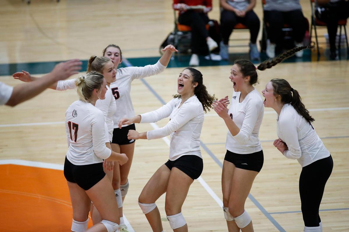 Paul Laurence Dunbar’s players celebrate after scoring against Frederick Douglass during Tuesday night’s match in Lexington. The Bulldogs are off to a 5-0 start this season.