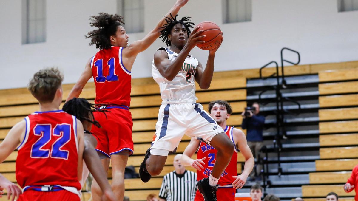 Frederick Douglass guard Aveion Chenault (2) jumped to score around Madison Central’s Jayden West (11) during a game last month. Chenault scored 18 against George Rogers Clark on Tuesday.