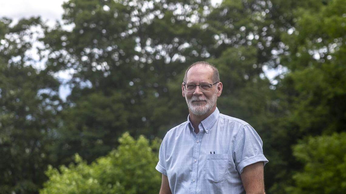 Lexington Herald-Leader reporter Bill Estep is photographed near the summit of Black Mountain in Harlan County, Ky., on Tuesday, June 17, 2025. 