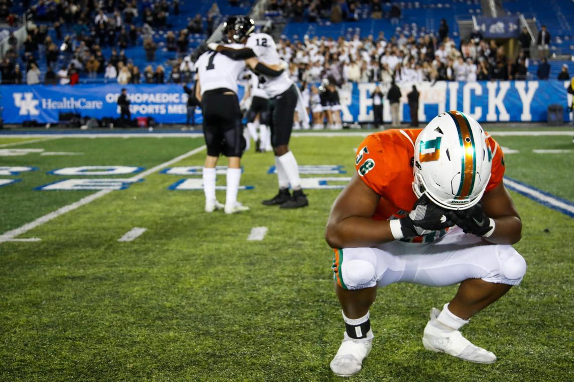 Frederick Douglass Broncos Leon Cooper (58) takes in the 38-26 loss to the South Warren Spartans during the 5A state football championship at Kroger Field in Lexington, Ky., Saturday, December 5, 2021.
