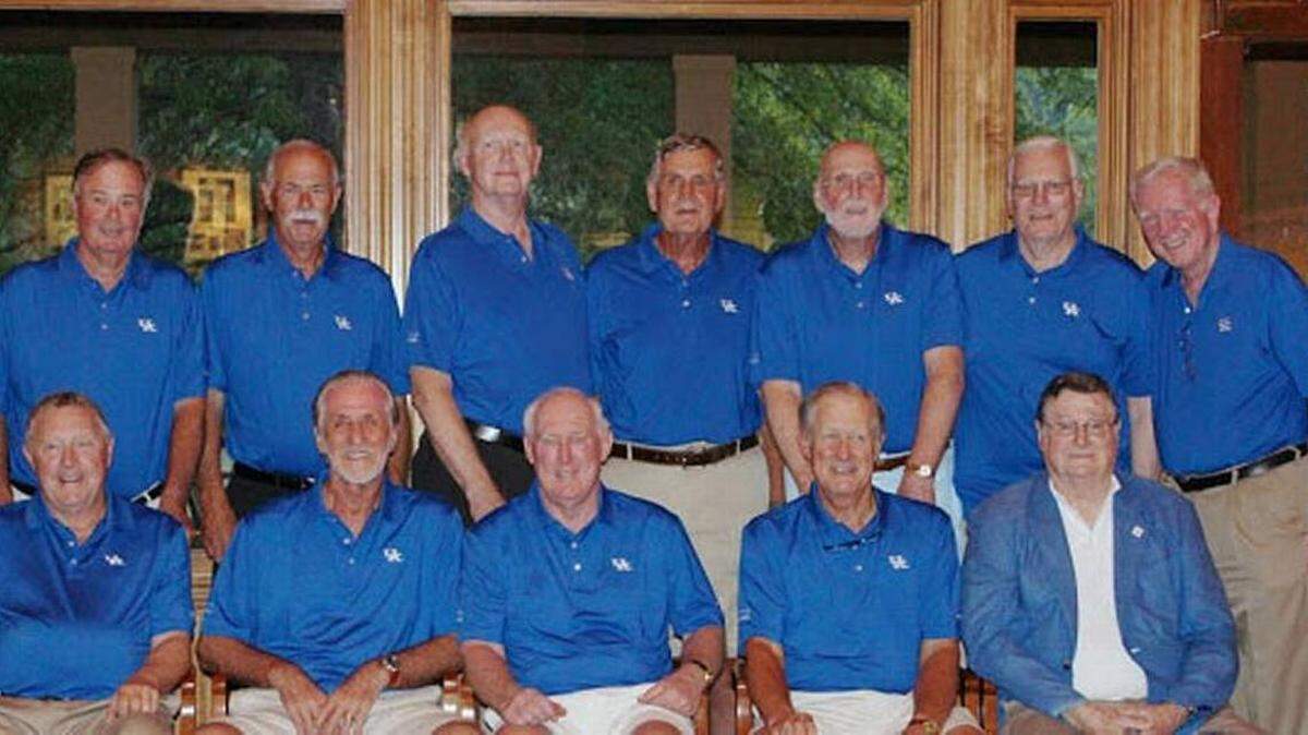 Kentucky’s national championship runner-up team of 1965-66, known as Rupp’s Runts, gathered for a photo in 2015. Front row, left to right: Gene Stewart, Pat Riley, Bob Tallent, Jim LeMaster, Joe B. Hall. Second row: Tommy Porter, Gary Gamble, Cliff Berger, Larry Lentz, Brad Bounds, Thad Jaracz, Larry Conley.
