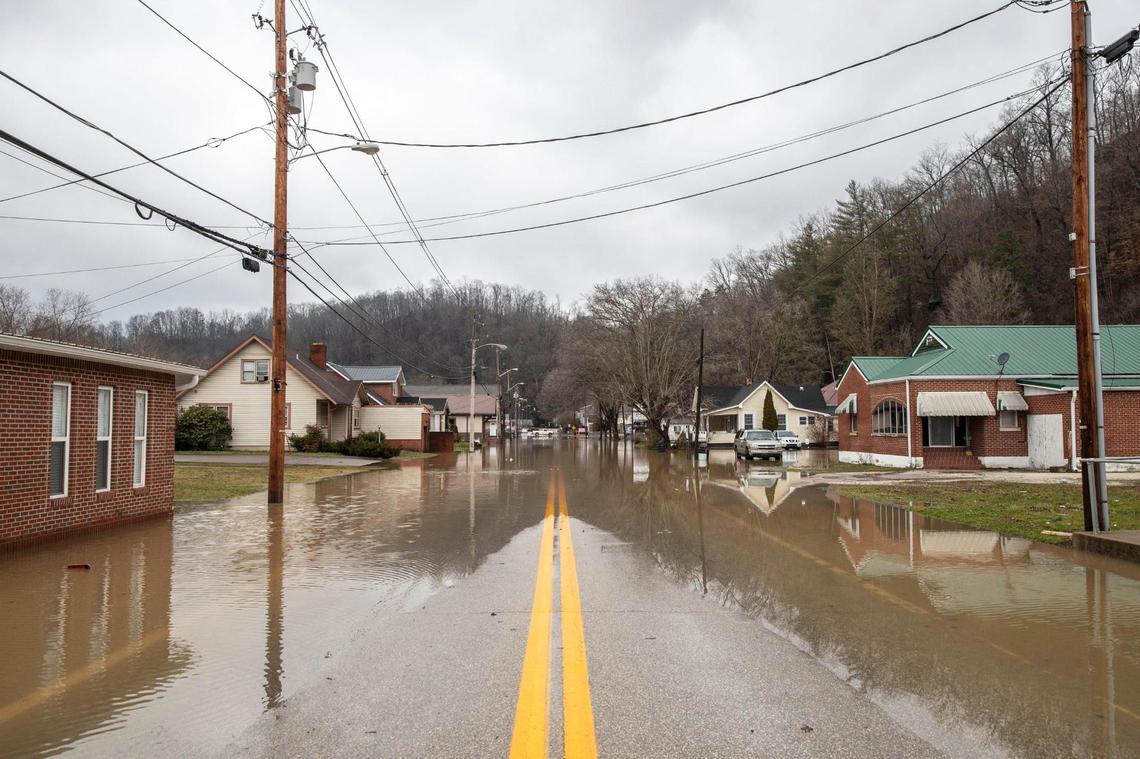 Water covered West Maple Street in Salyersville Monday.