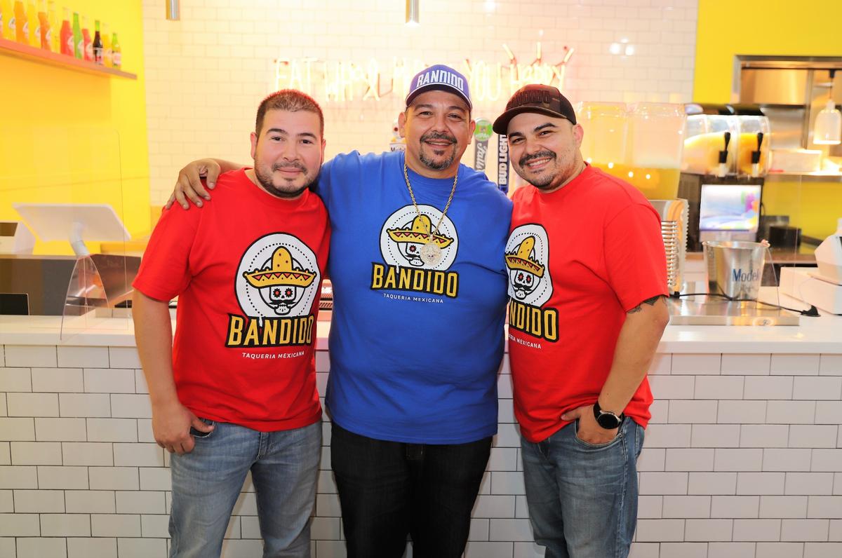 Vincente Diaz (left), Gerardo Ochoa (center), and Albert Ochoa (right), the managing partners of Bandido Taqueria Mexicana, will officially open Lexington’s first Southern California-style taqueria on Sept. 25. The Lexington restaurant will be the third location for the Louisville-based chain.