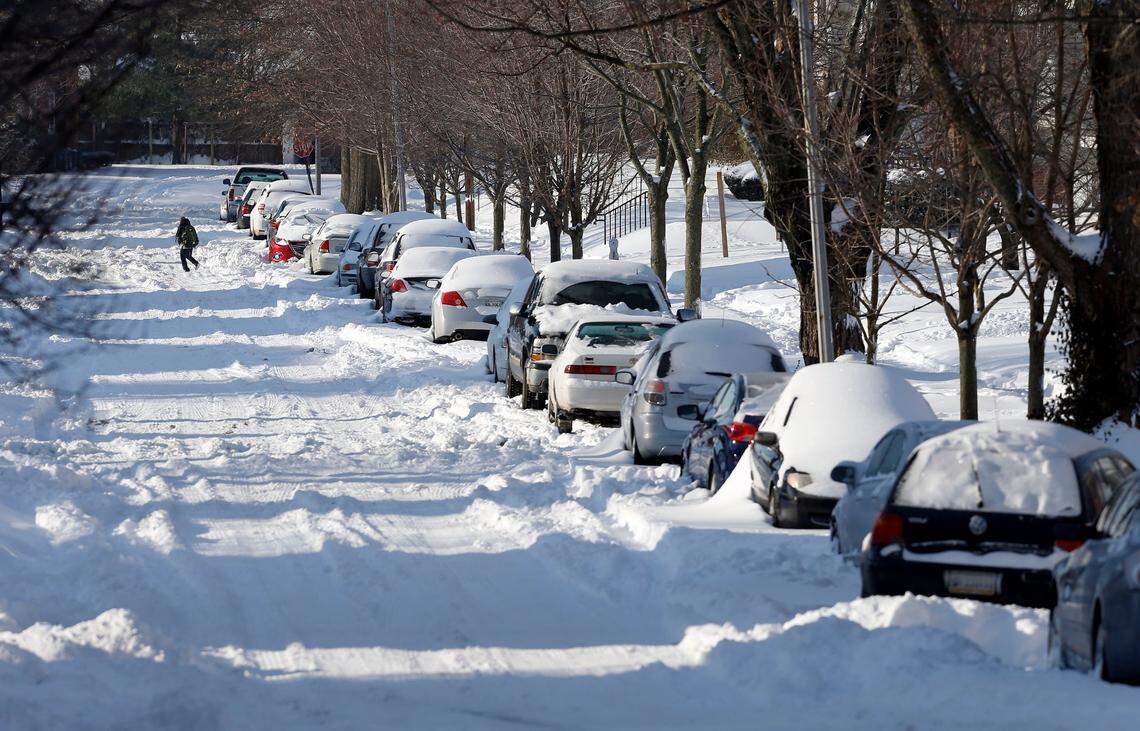 Foot traffic seemed to be the best bet for travel on Duke Rd. in Lexington, Ky., Tuesday February 17, 2015. A major winter storm crossed Kentucky yesterday with as much as 17 inches of snow reported in some spots. Photo by Charles Bertram | Staff