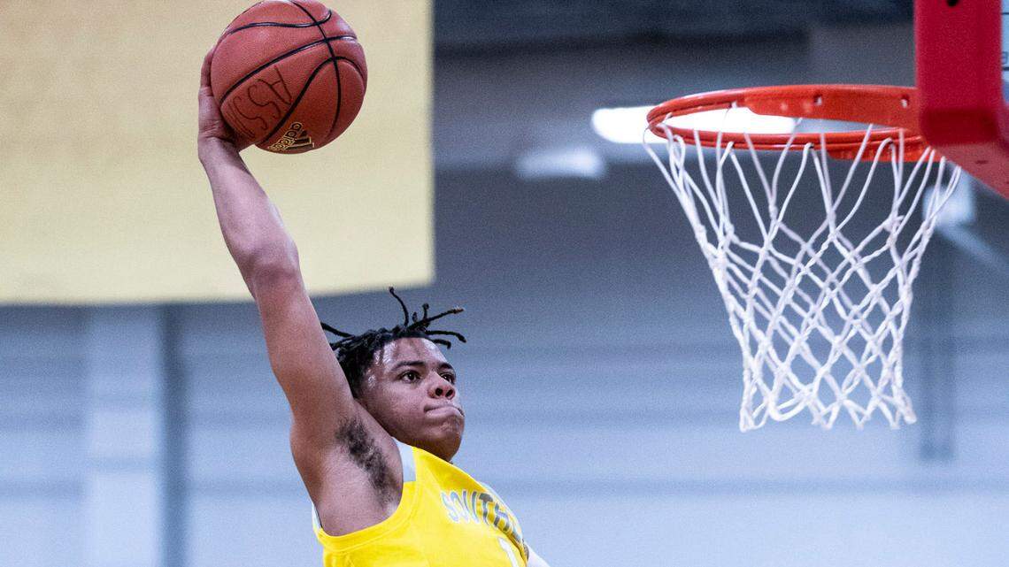 Keyonte George flies in for a dunk on the Adidas circuit in July.