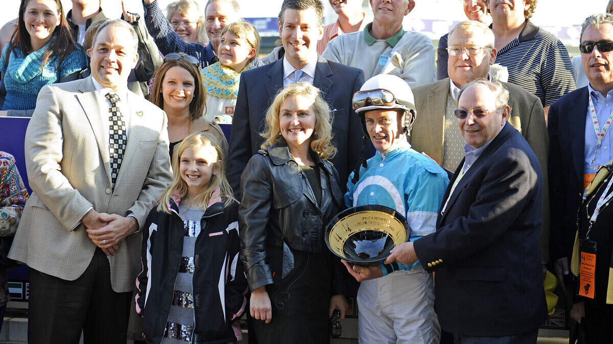 Caption: PRES: right to left.  trainer Gary Hartlage, Jockey Joe Johnson, Owner Anita Cauley,
On Fire Baby with Joe Johnson up (#4) wins the Pocahontas Stakes (gr. II).
Works and schooling with Breeders' Cup horses at Churchill Downs in Louisville, Ky. on Oct. 30, 2011
PocahontasSTake2CD image306
Photo by Anne M. Eberhardt