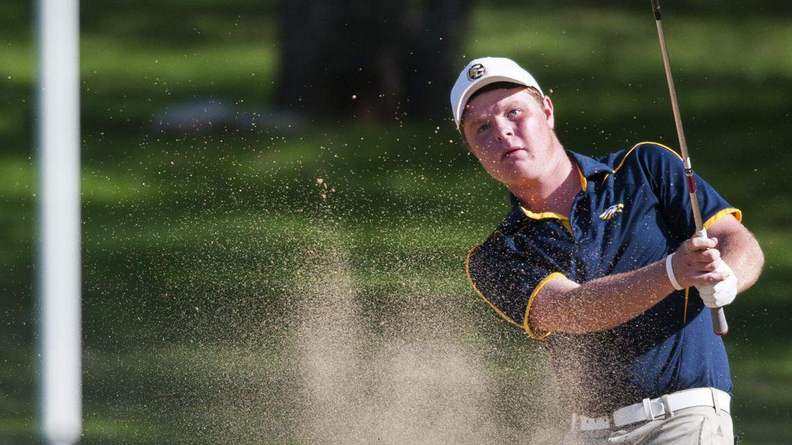 Franklin County's C.J. Jones chips onto the green during the state championship on Wednesday, Oct. 7, 2015, at Bowling Green Country Club. (Austin Anthony/photo@bgdailynews.com)