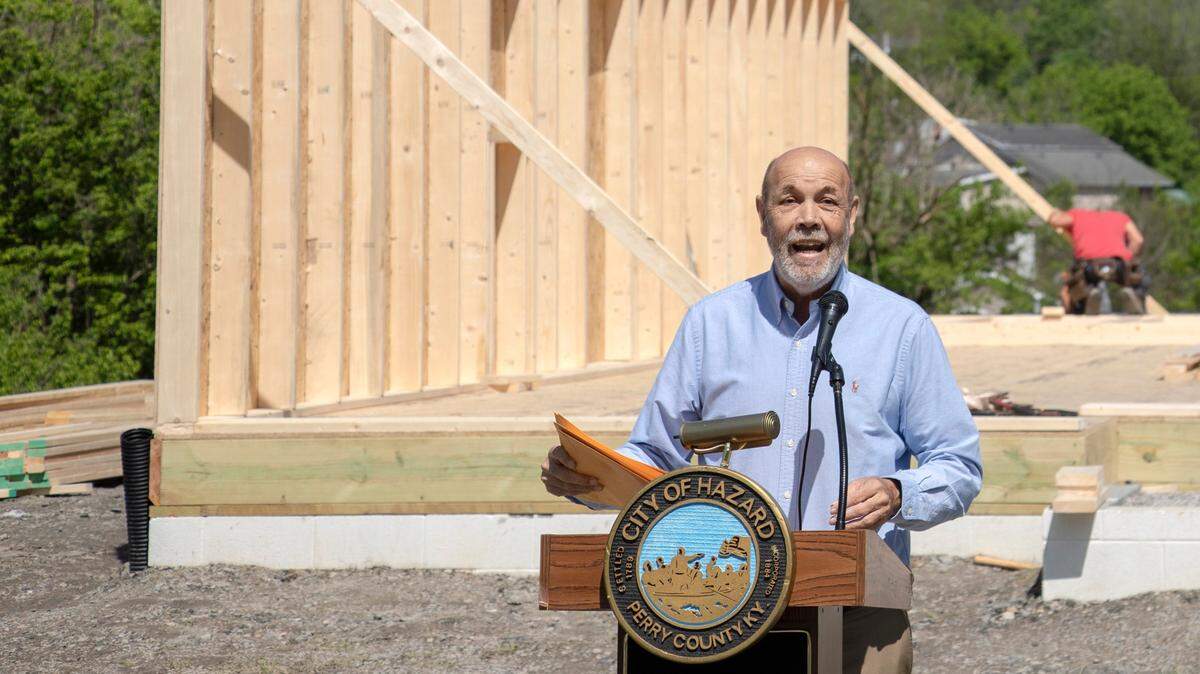 Hazard Mayor Donald “Happy” Mobelini speaks during a wall raising event where nonprofit Housing Development Alliance announced it is constructing a 15-home subdivision in the Allais area of Hazard, Ky., Tuesday, May 11, 2021.