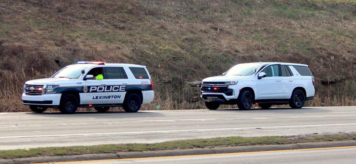 Lexington police park along New Circle Road while clearing up a bus crash on Wednesday. No one was injured in the incident
