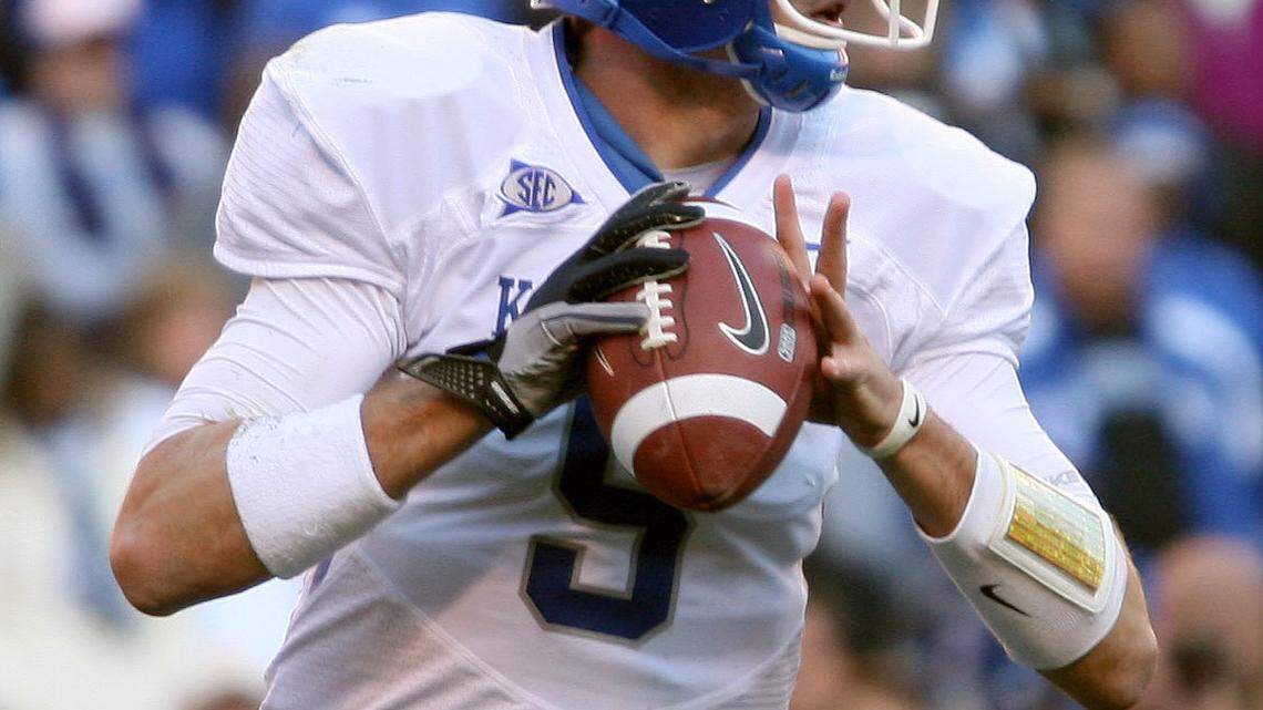 Kentucky Wildcats quarterback Mike Hartline looks for an open receiver during the fourth quarter of Kentucky at the University of Tennessee Nov. 27, 2010. Photo by Amy Wallot