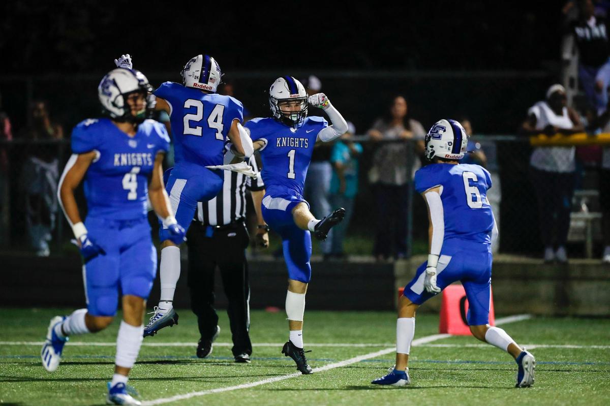 Lexington Catholic’s Max DeGraff (1) celebrates scoring one of his five touchdowns against Henry Clay on Friday night. DeGraff also kicked two field goals.
