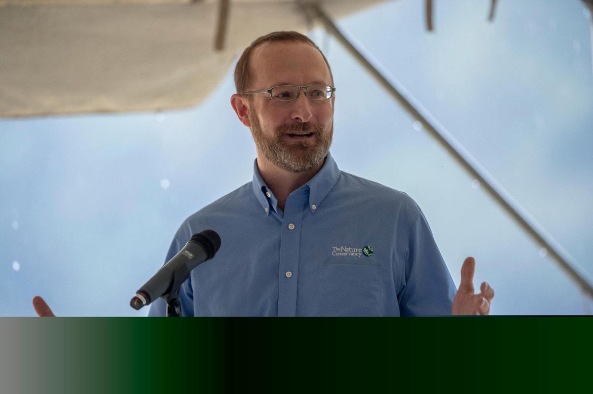 David Phemister, Kentucky state director of the Nature Conservancy, speaks during a media conference about a project environmental and federal groups have teamed up on to remove Green River Lock and Dam No. 5 in Butler County, Ky., on Monday, Sept. 20, 2021.