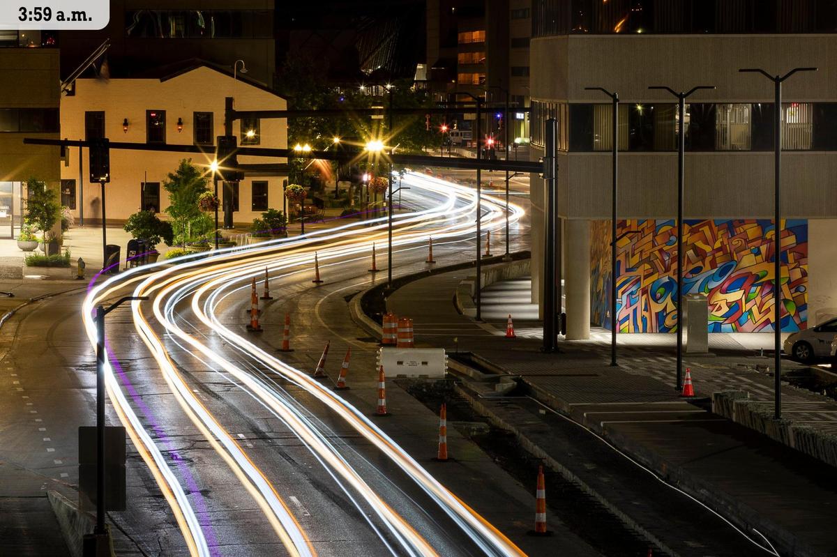 Cars drive down downtown’s Vine Street Saturday, July 10 in this long-exposure picture.