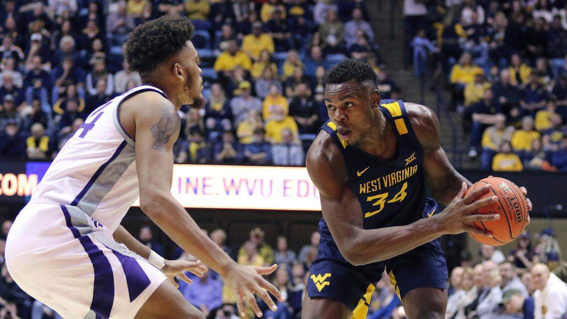 Oscar Tshiebwe, right, averaged 11.2 points and 9.3 rebounds in 23.3 minutes per game as a freshman at West Virginia last season.