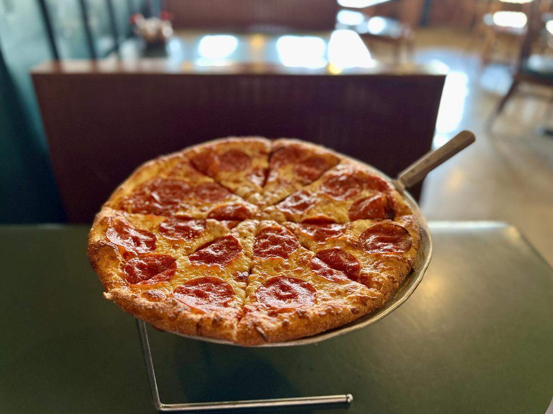 A pepperoni pizza from The Goose and Gander ($17.99). The Midway restaurant delivers meals to the nearby The Bruen Bunker, a new golf simulator bar.